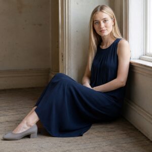 Meadow Gate sleeveless column dress — Everyday Column Dresses by ORASCI. worn by a model.