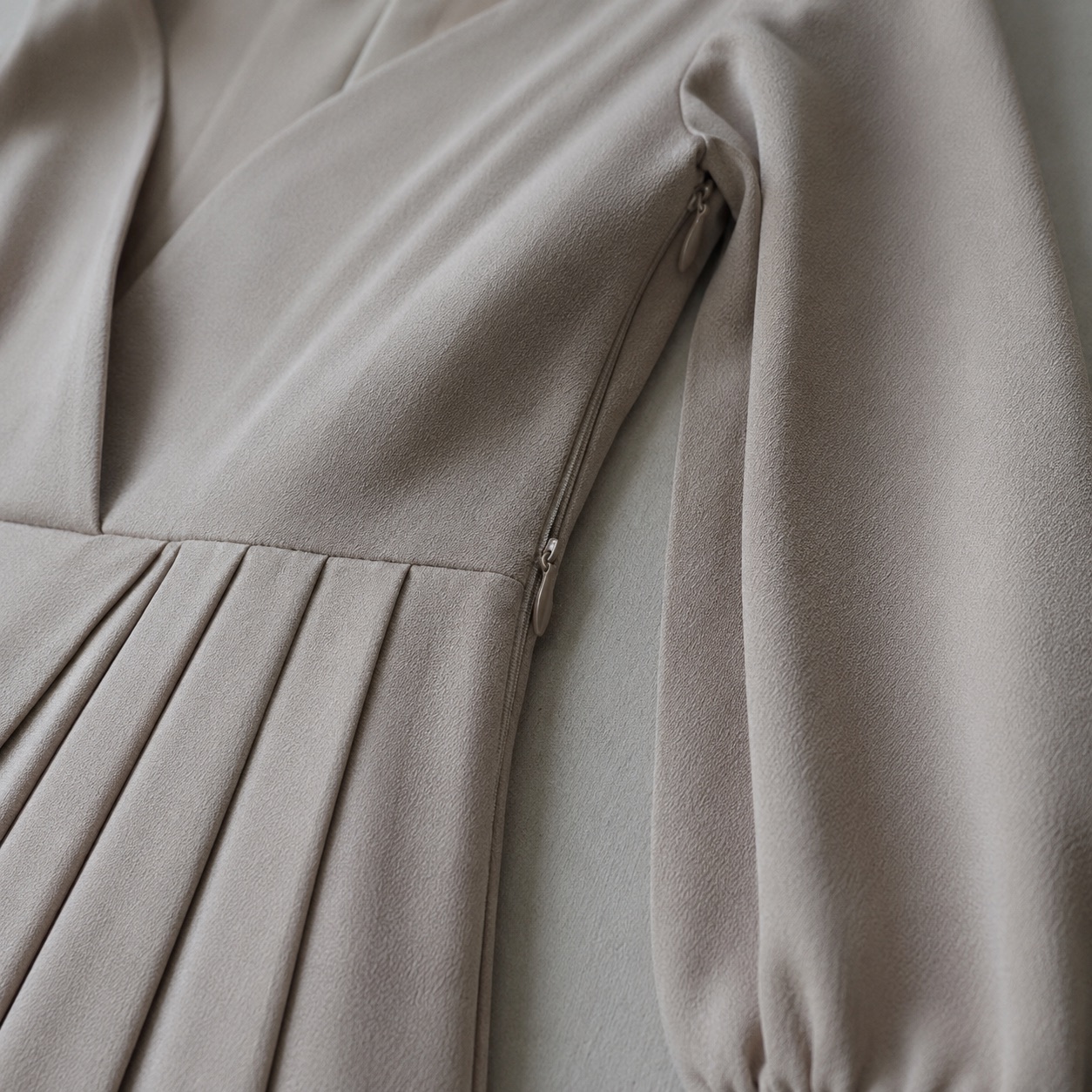 Chislehurst sunray-pleat midi dress — Pleated Midi Dresses by ORASCI. close detail of the fabric and finish.