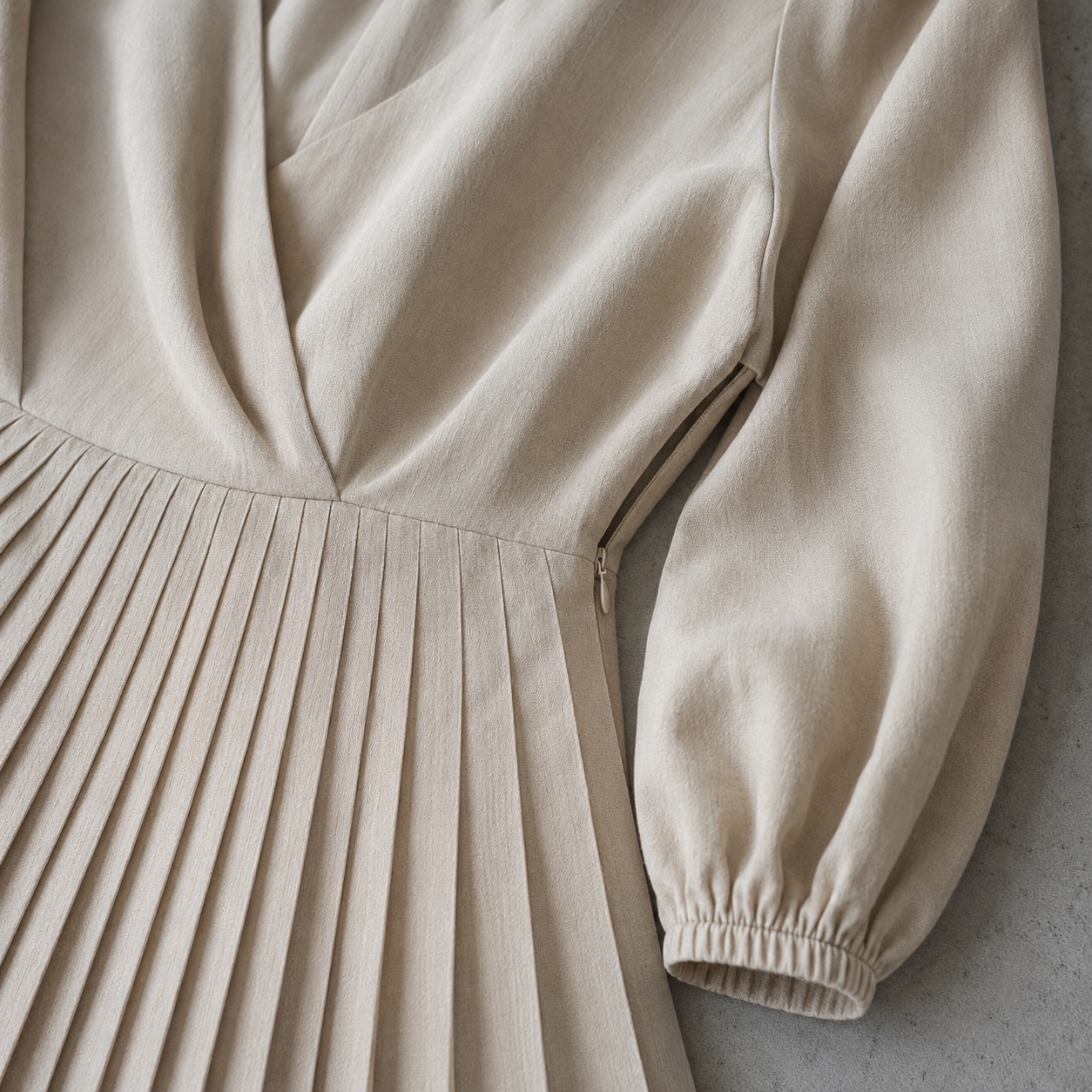 Bromley Vale sunray-pleat midi dress — Pleated Midi Dresses by ORASCI. close detail of the fabric and finish.