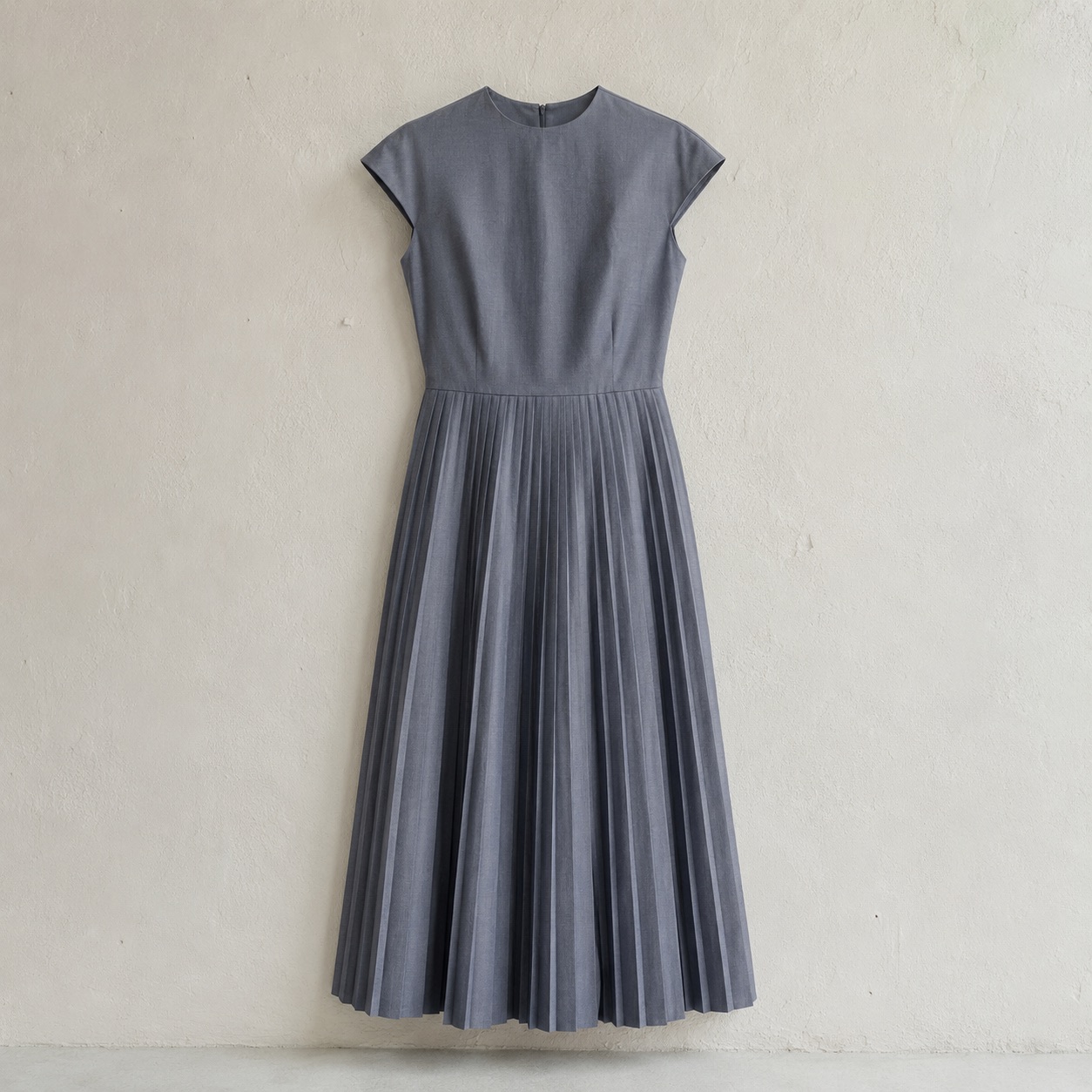 Slate Hollow knife-pleat midi dress — Pleated Midi Dresses by ORASCI. product photograph on a white background.