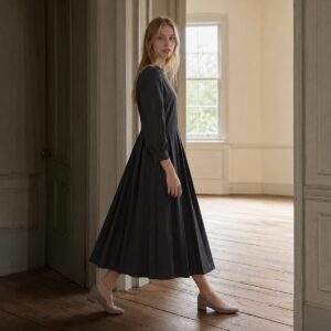 Linden Row knife-pleat midi dress — Pleated Midi Dresses by ORASCI. worn by a model.