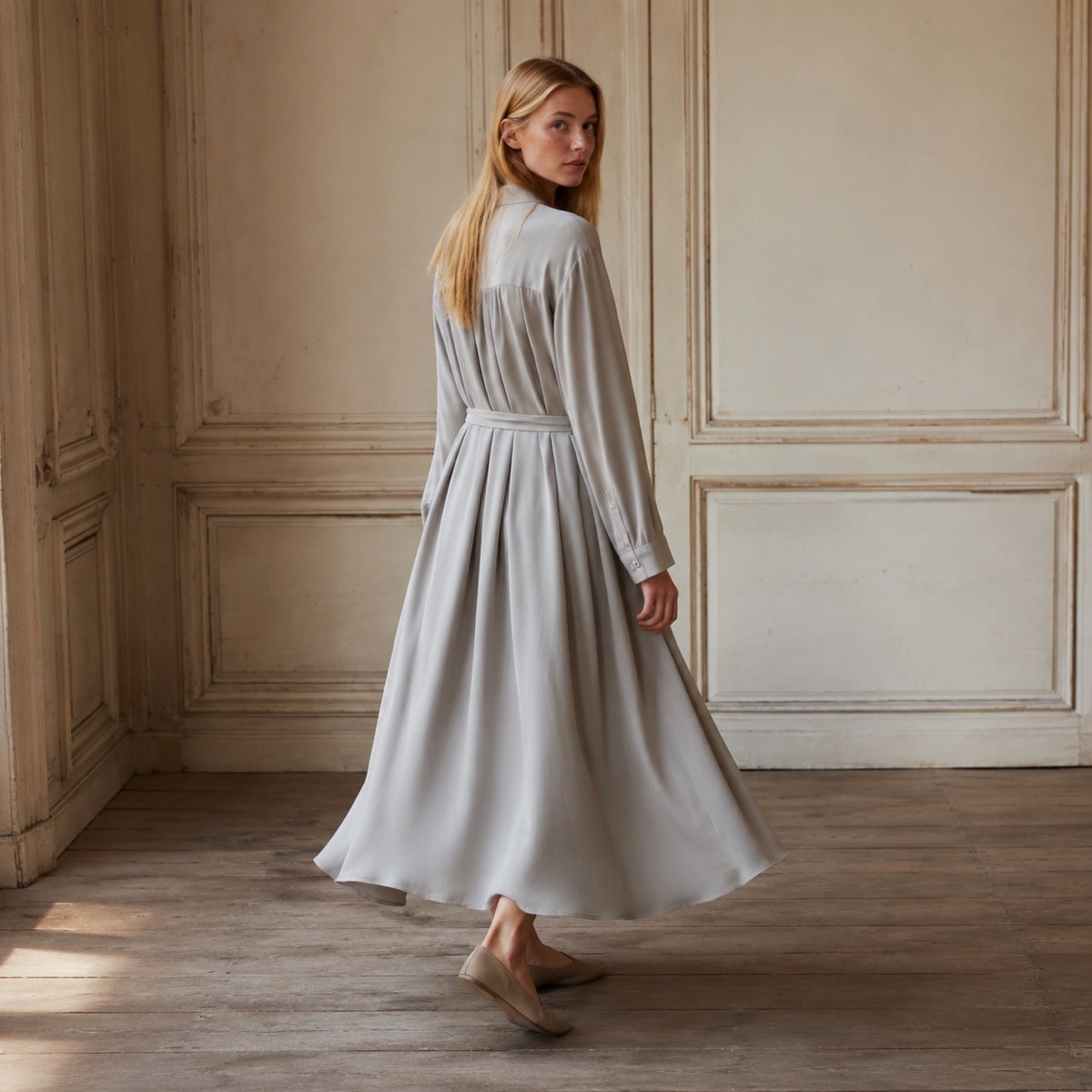 Shortlands collarless shirt dress — Shirt Dresses by ORASCI. worn by a model, side view.