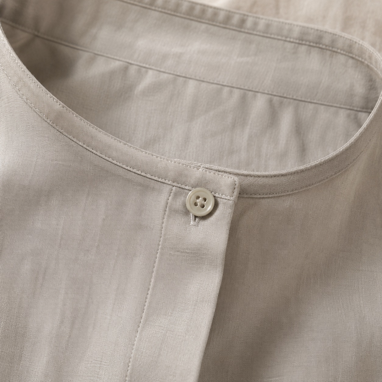 Pearl Wharf collarless shirt dress — Shirt Dresses by ORASCI. close detail of the fabric and finish.