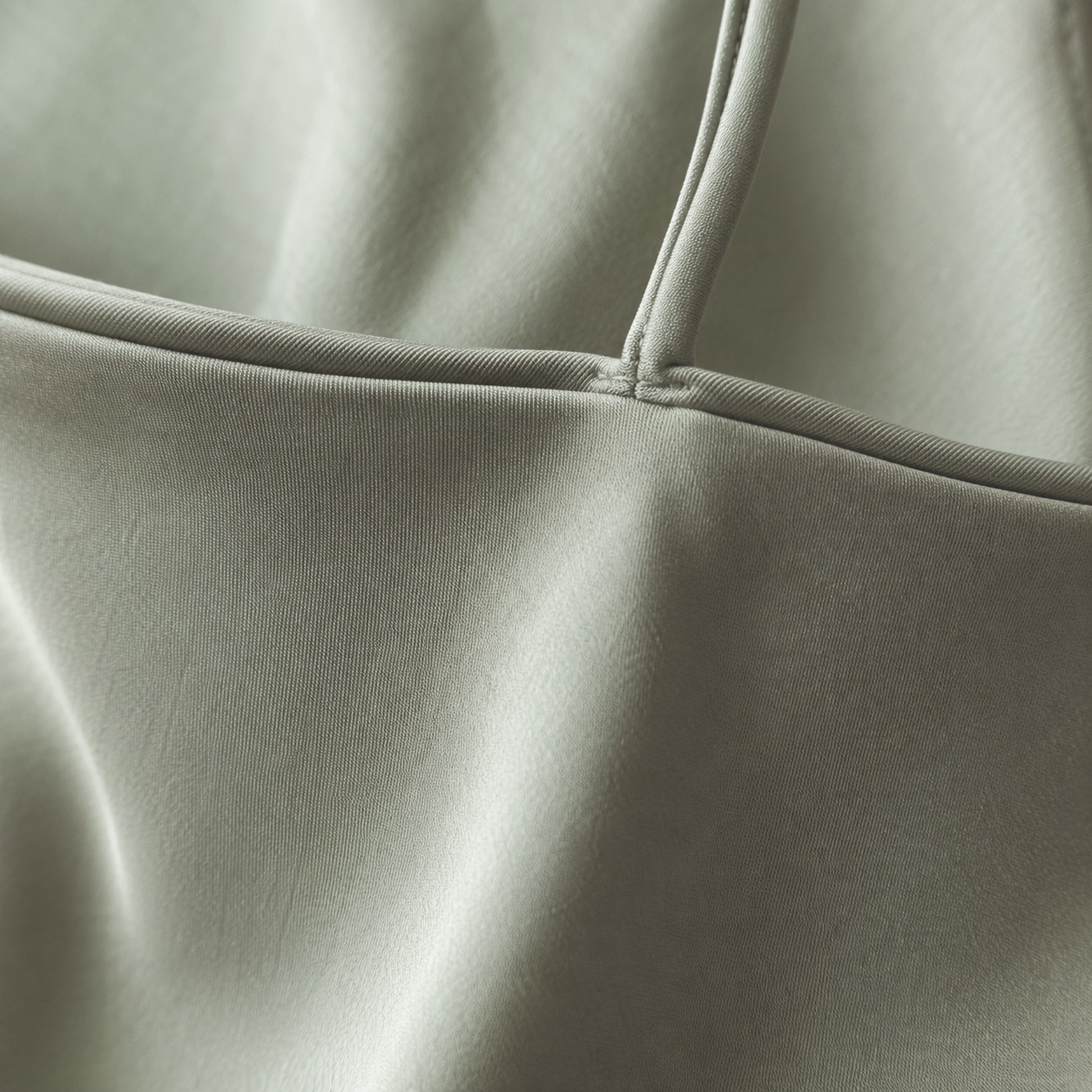 Linden Row bias-cut slip maxi dress — Slip Maxi Dresses by ORASCI. close detail of the fabric and finish.